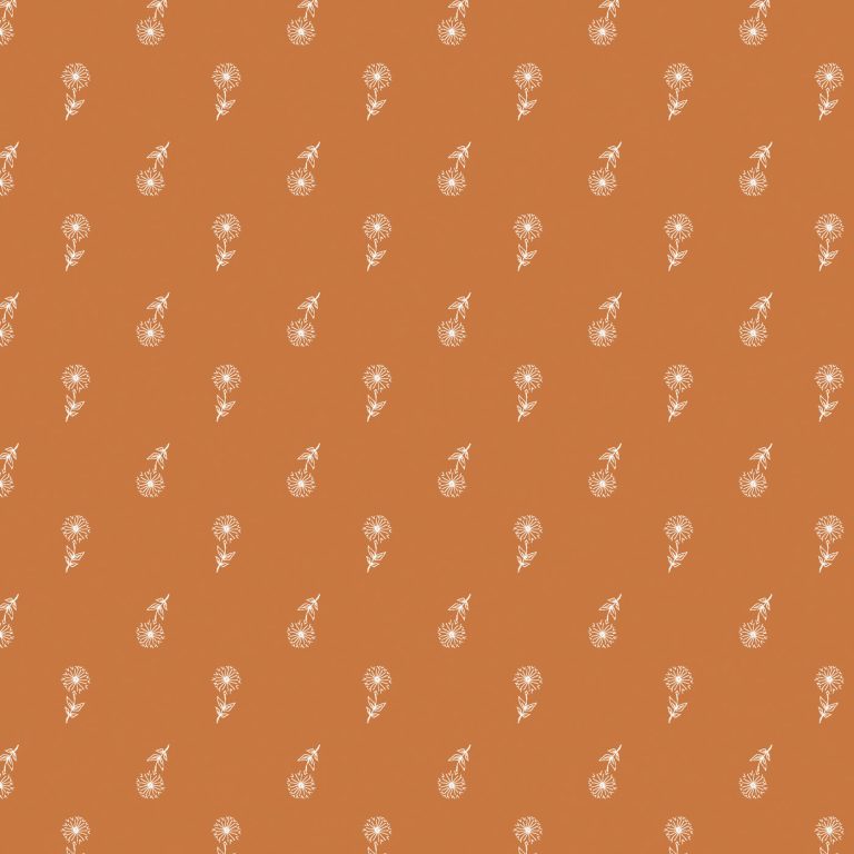 White dandelions on a orange background fabric